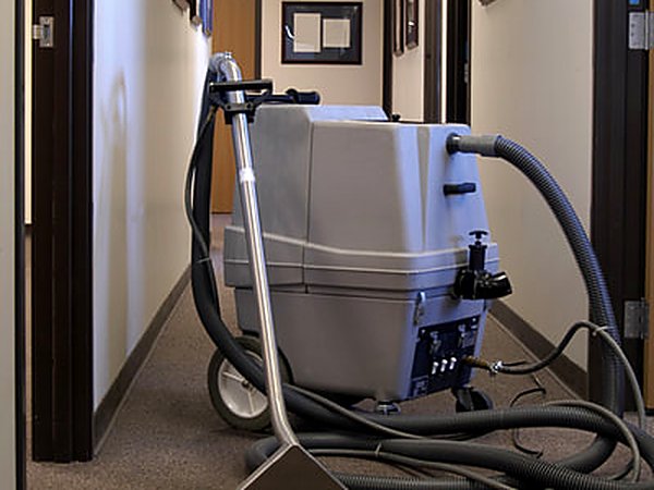 Carpet extraction underway during a move-out cleaning in San Antonio TX